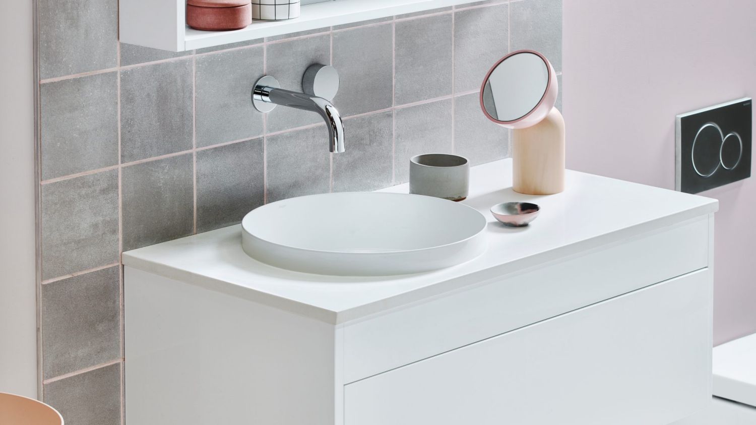 Simple white bathroom vanity in combination with grey tiles creates calm and modern athmosphere // reece.com.au
